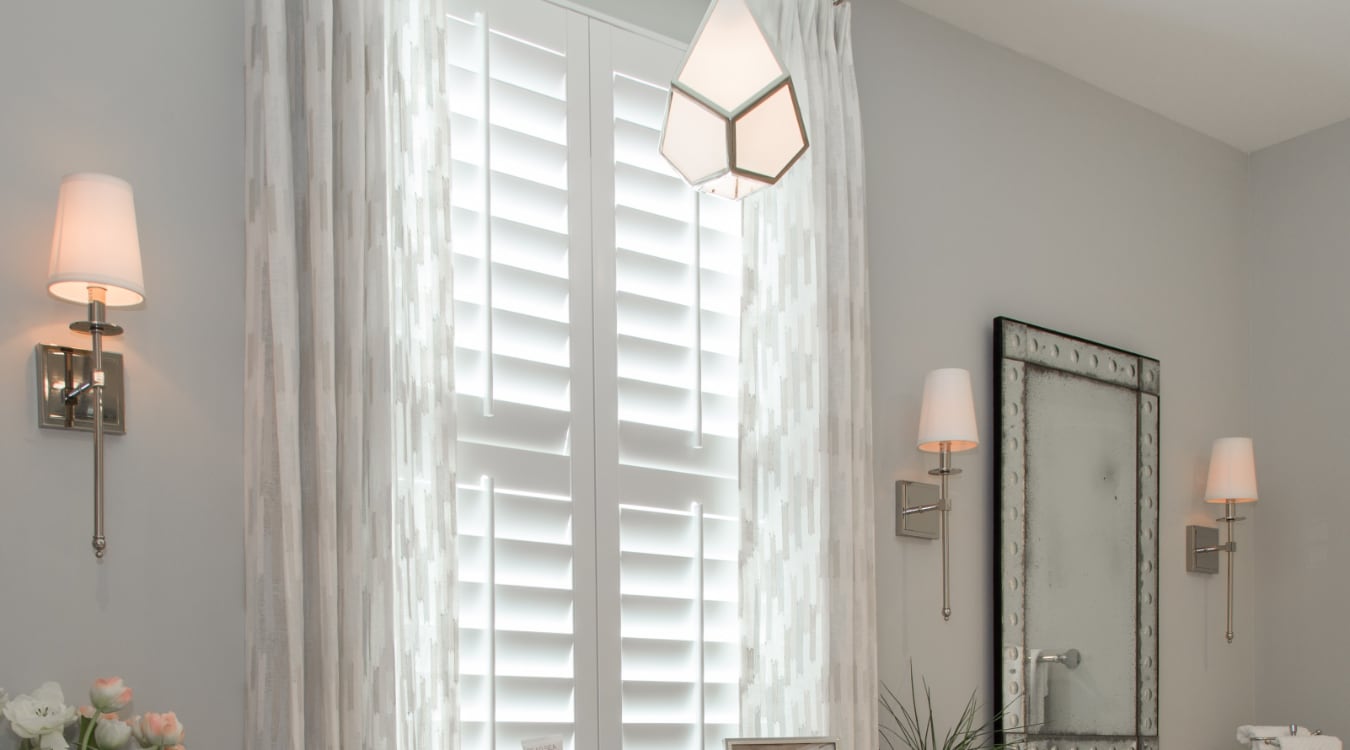 Plantation shutters in bathroom.